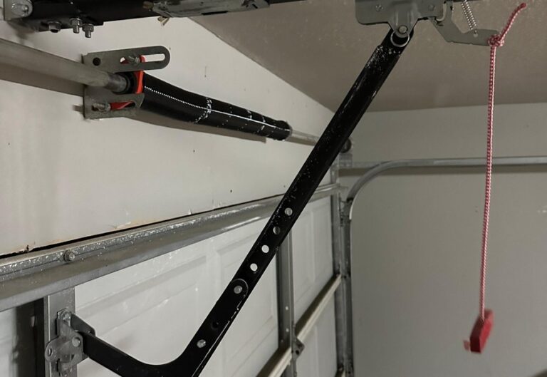 Before interior garage door track repair